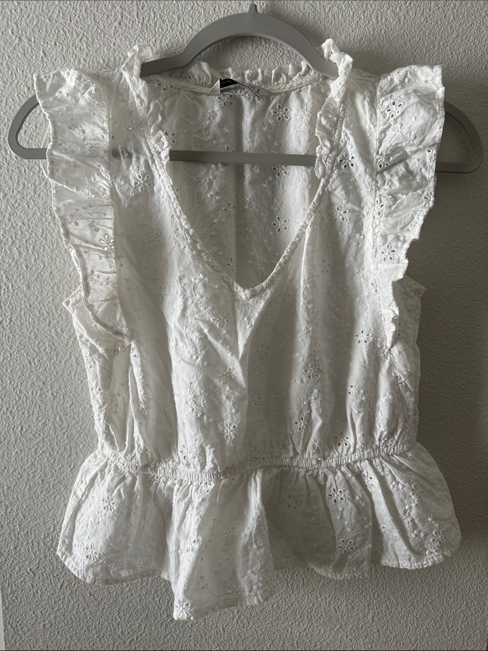 Embroidered Peplum Top